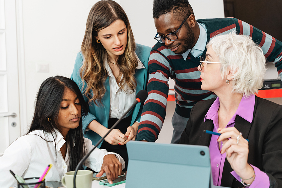Diverse team collaborating in a facilitated group discussion